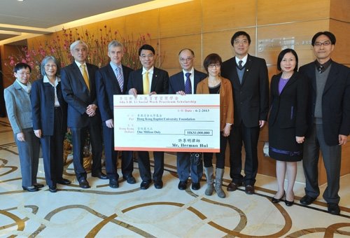 President Chan (fifth from left) receives a cheque of HK$1 million from Mr. Herman Hui (sixth from left). The scholarships will be awarded to outstanding Social Work students to gain practical overseas experience