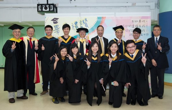 Professor Albert Chan (back row, third from right) and staff pose for a photo with graduating students after the Baccalaureate Service