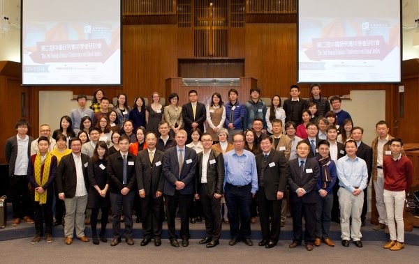 Guests, speakers and participants pose for a photo