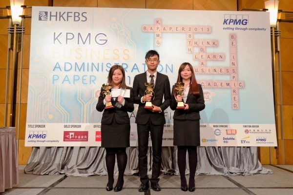 (From left) Kimberly Lui, Zhang Wenning and Miley Liu capture two awards at the KPMG Business Administration Paper 2013