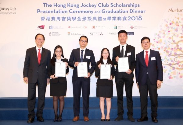Accompanied by Professor Rick Wong (right), Vice-President (Research and Development), the four outstanding students receive a scholarship from Mr Philip Chen (left), Steward of The Hong Kong Jockey Club