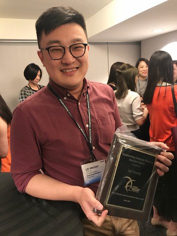 Vincent Huang receives recognition for his teaching performance.