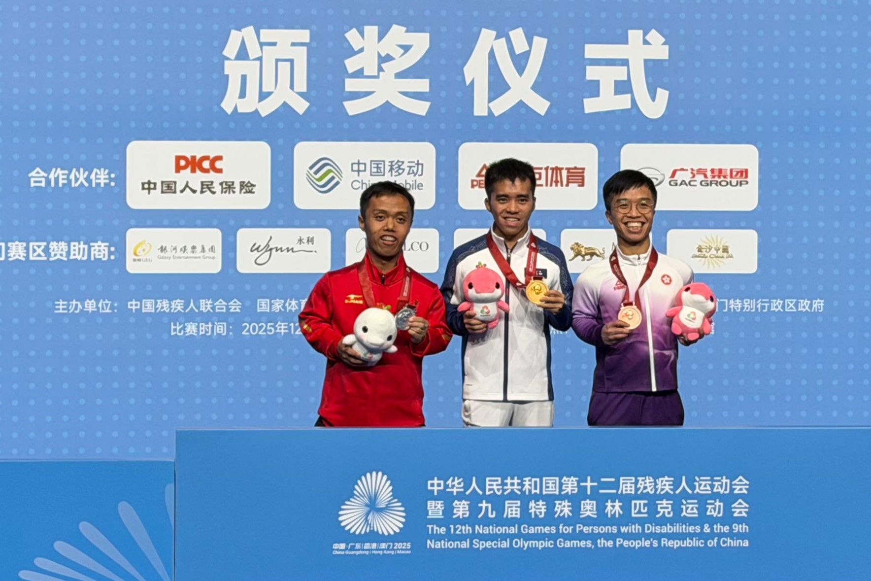 Wong Chun-yim (right) wins two badminton bronzes.