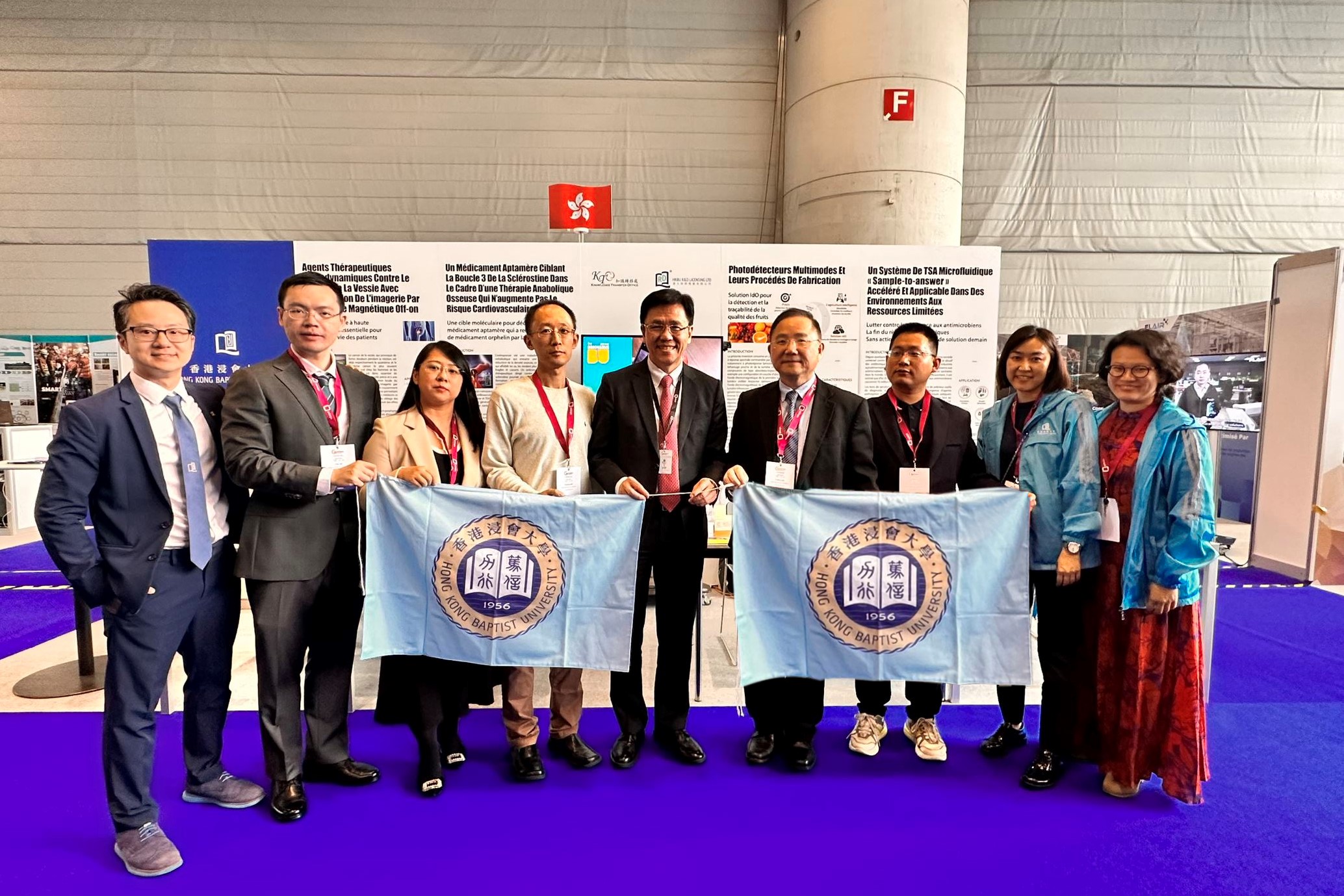 Professor Sun Dong, Secretary for Innovation, Technology and Industry of the HKSAR Government (middle) visits HKBU’s booth at the 48th International Exhibition of Inventions of Geneva.